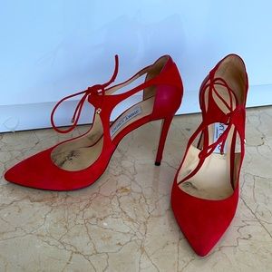 Jimmy Choo red heels.